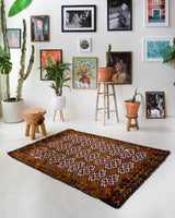 Vintage kilim rug in living room setting, bright colors, wild shaman, soft rug, bold color, Portland, Oregon, rug store, rug shop, local shop, vintage rug, modern kilim, warm colors