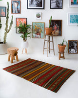 Vintage mini kilim rug in room decor setting, kilim, Turkish rug, vintage rug, portland, rug shop, bright colors, wild shaman, soft rug, bold color, Portland, Oregon, rug store, rug shop, local shop