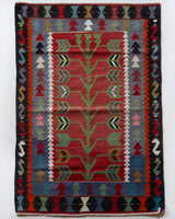 Vintage mini kilim rug in room decor setting, kilim, Turkish rug, vintage rug, portland, rug shop, bright colors, wild shaman, soft rug, bold color, Portland, Oregon, rug store, rug shop, local shop