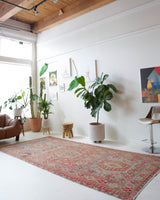 Vintage kilim rug in living room setting, old rug, antique rug, pastel colors, faded colors, Turkish rug, vintage rug, soft rug, Portland, Oregon, rug store, rug shop, local shop, earthy tones, earthy colors, warm colors