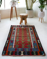 Vintage mini kilim rug in room decor setting, kilim, Turkish rug, vintage rug, portland, rug shop, bright colors, wild shaman, soft rug, bold color, Portland, Oregon, rug store, rug shop, local shop