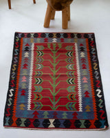 Vintage mini kilim rug in room decor setting, kilim, Turkish rug, vintage rug, portland, rug shop, bright colors, wild shaman, soft rug, bold color, Portland, Oregon, rug store, rug shop, local shop
