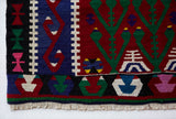 Vintage mini kilim rug in room decor setting, kilim, Turkish rug, vintage rug, portland, rug shop, bright colors, wild shaman, soft rug, bold color, Portland, Oregon, rug store, rug shop, local shop