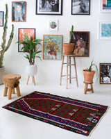 Vintage mini kilim rug in room decor setting, kilim, Turkish rug, vintage rug, portland, rug shop, bright colors, wild shaman, soft rug, bold color, Portland, Oregon, rug store, rug shop, local shop