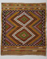 Vintage mini kilim rug in room decor setting, kilim, Turkish rug, vintage rug, portland, rug shop, bright colors, wild shaman, soft rug, bold color, Portland, Oregon, rug store, rug shop, local shop