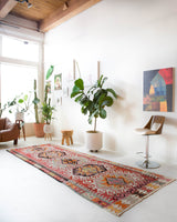 Vintage kilim rug in living room setting, old rug, antique rug, pastel colors, faded colors, Turkish rug, vintage rug, soft rug, Portland, Oregon, rug store, rug shop, local shop, earthy tones, earthy colors, warm colors
