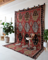Vintage kilim rug in room decor setting, old rug, antique rug, pastel colors, faded colors, Turkish rug, vintage rug, soft rug, Portland, Oregon, rug store, rug shop, local shop, bold colors, bright colors, faded colors