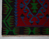 Vintage mini kilim rug in room decor setting, kilim, Turkish rug, vintage rug, portland, rug shop, bright colors, wild shaman, soft rug, bold color, Portland, Oregon, rug store, rug shop, local shop
