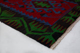 Vintage mini kilim rug in room decor setting, kilim, Turkish rug, vintage rug, portland, rug shop, bright colors, wild shaman, soft rug, bold color, Portland, Oregon, rug store, rug shop, local shop