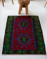 Vintage mini kilim rug in room decor setting, kilim, Turkish rug, vintage rug, portland, rug shop, bright colors, wild shaman, soft rug, bold color, Portland, Oregon, rug store, rug shop, local shop
