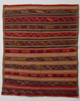 Vintage Turkish mini rug in room decor setting, old rug, antique rug, pastel colors, faded colors, Turkish rug, vintage rug, soft rug, Portland, Oregon, rug store, rug shop, local shop,  bright colors, bold colors