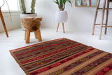 Vintage Turkish mini rug in room decor setting, old rug, antique rug, pastel colors, faded colors, Turkish rug, vintage rug, soft rug, Portland, Oregon, rug store, rug shop, local shop,  bright colors, bold colors