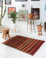 Vintage Turkish mini rug in room decor setting, old rug, antique rug, pastel colors, faded colors, Turkish rug, vintage rug, soft rug, Portland, Oregon, rug store, rug shop, local shop,  bright colors, bold colors