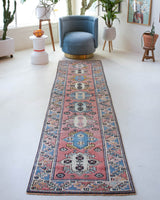 Vintage Turkish runner rug in living room setting, old rug, antique rug, pastel colors, faded colors, Turkish rug, vintage rug, soft rug, Portland, Oregon, rug store, rug shop, local shop