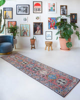 Vintage Turkish runner rug in living room setting, old rug, antique rug, pastel colors, faded colors, Turkish rug, vintage rug, soft rug, Portland, Oregon, rug store, rug shop, local shop