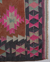 Vintage kilim rug in room decor setting, old rug, antique rug, pastel colors, faded colors, Turkish rug, vintage rug, soft rug, Portland, Oregon, rug store, rug shop, local shop, bold colors, bright colors, faded colors