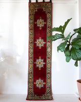 Vintage Turkish runner rug in a living room setting, pile rug, Turkish rug, vintage rug, portland, rug shop, bright colors, wild shaman, soft rug, bold color, Portland, Oregon, rug store, rug shop, local shop, antique rug