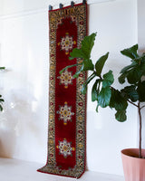 Vintage Turkish runner rug in a living room setting, pile rug, Turkish rug, vintage rug, portland, rug shop, bright colors, wild shaman, soft rug, bold color, Portland, Oregon, rug store, rug shop, local shop, antique rug