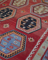 Vintage kilim rug in room decor setting, old rug, antique rug, pastel colors, faded colors, Turkish rug, vintage rug, soft rug, Portland, Oregon, rug store, rug shop, local shop, bold colors, bright colors, faded colors