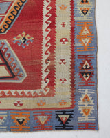 Vintage kilim rug in room decor setting, old rug, antique rug, pastel colors, faded colors, Turkish rug, vintage rug, soft rug, Portland, Oregon, rug store, rug shop, local shop, bold colors, bright colors, faded colors