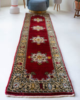 Vintage Turkish runner rug in a living room setting, pile rug, Turkish rug, vintage rug, portland, rug shop, bright colors, wild shaman, soft rug, bold color, Portland, Oregon, rug store, rug shop, local shop, antique rug