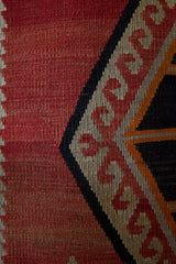 Vintage kilim rug in room decor setting, old rug, antique rug, pastel colors, faded colors, Turkish rug, vintage rug, soft rug, Portland, Oregon, rug store, rug shop, local shop, bold colors, bright colors, faded colors