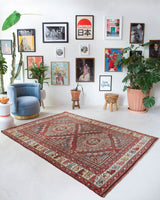 Vintage Turkish rug in living room setting, old rug, antique rug, pastel colors, faded colors, Turkish rug, vintage rug, soft rug, Portland, Oregon, rug store, rug shop, local shop