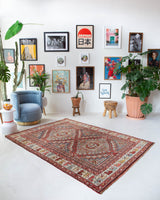 Vintage Turkish rug in living room setting, old rug, antique rug, pastel colors, faded colors, Turkish rug, vintage rug, soft rug, Portland, Oregon, rug store, rug shop, local shop