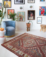 Vintage Turkish rug in living room setting, old rug, antique rug, pastel colors, faded colors, Turkish rug, vintage rug, soft rug, Portland, Oregon, rug store, rug shop, local shop