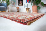 Vintage Turkish rug in living room setting, old rug, antique rug, pastel colors, faded colors, Turkish rug, vintage rug, soft rug, Portland, Oregon, rug store, rug shop, local shop