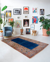 Vintage Turkish rug in a living room setting, pile rug, Turkish rug, vintage rug, portland, rug shop, bright colors, wild shaman, soft rug, bold color, Portland, Oregon, rug store, rug shop, local shop, antique rug