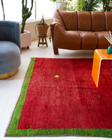 Vintage Turkish rug in a living room setting, pile rug, Turkish rug, vintage rug, portland, rug shop, bright colors, wild shaman, soft rug, bold color, Portland, Oregon, rug store, rug shop, local shop, antique rug