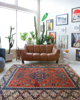 Vintage Turkish rug in living room setting, old rug, antique rug, pastel colors, faded colors, Turkish rug, vintage rug, soft rug, Portland, Oregon, rug store, rug shop, local shop