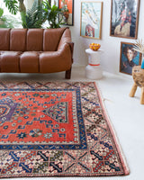 Vintage Turkish rug in living room setting, old rug, antique rug, pastel colors, faded colors, Turkish rug, vintage rug, soft rug, Portland, Oregon, rug store, rug shop, local shop
