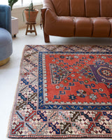 Vintage Turkish rug in living room setting, old rug, antique rug, pastel colors, faded colors, Turkish rug, vintage rug, soft rug, Portland, Oregon, rug store, rug shop, local shop