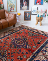 Vintage Turkish rug in living room setting, old rug, antique rug, pastel colors, faded colors, Turkish rug, vintage rug, soft rug, Portland, Oregon, rug store, rug shop, local shop