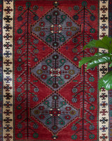 Vintage Turkish rug in a living room setting, pile rug, Turkish rug, vintage rug, portland, rug shop, bright colors, wild shaman, soft rug, bold color, Portland, Oregon, rug store, rug shop, local shop, antique rug