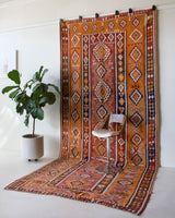 Vintage kilim rug in room decor setting, old rug, antique rug, pastel colors, faded colors, Turkish rug, vintage rug, soft rug, Portland, Oregon, rug store, rug shop, local shop, bold colors, bright colors, faded colors