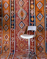 Vintage kilim rug in room decor setting, old rug, antique rug, pastel colors, faded colors, Turkish rug, vintage rug, soft rug, Portland, Oregon, rug store, rug shop, local shop, bold colors, bright colors, faded colors