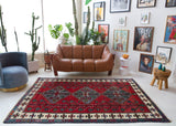 Vintage Turkish rug in a living room setting, pile rug, Turkish rug, vintage rug, portland, rug shop, bright colors, wild shaman, soft rug, bold color, Portland, Oregon, rug store, rug shop, local shop, antique rug