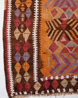 Vintage kilim rug in room decor setting, old rug, antique rug, pastel colors, faded colors, Turkish rug, vintage rug, soft rug, Portland, Oregon, rug store, rug shop, local shop, bold colors, bright colors, faded colors