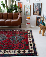 Vintage Turkish rug in a living room setting, pile rug, Turkish rug, vintage rug, portland, rug shop, bright colors, wild shaman, soft rug, bold color, Portland, Oregon, rug store, rug shop, local shop, antique rug