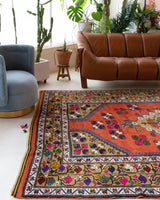 Vintage Turkish rug in a living room setting, pile rug, Turkish rug, vintage rug, portland, rug shop, bright colors, wild shaman, soft rug, bold color, Portland, Oregon, rug store, rug shop, local shop, antique rug