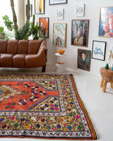 Vintage Turkish rug in a living room setting, pile rug, Turkish rug, vintage rug, portland, rug shop, bright colors, wild shaman, soft rug, bold color, Portland, Oregon, rug store, rug shop, local shop, antique rug