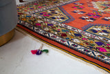 Vintage Turkish rug in a living room setting, pile rug, Turkish rug, vintage rug, portland, rug shop, bright colors, wild shaman, soft rug, bold color, Portland, Oregon, rug store, rug shop, local shop, antique rug