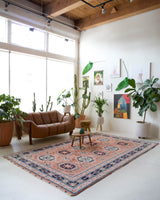 Vintage Turkish rug in a living room setting, pile rug, Turkish rug, vintage rug, portland, rug shop, bright colors, wild shaman, soft rug, bold color, Portland, Oregon, rug store, rug shop, local shop,