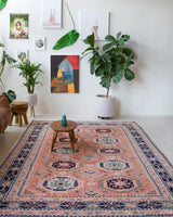 Vintage Turkish rug in a living room setting, pile rug, Turkish rug, vintage rug, portland, rug shop, bright colors, wild shaman, soft rug, bold color, Portland, Oregon, rug store, rug shop, local shop,
