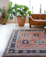 Vintage Turkish rug in a living room setting, pile rug, Turkish rug, vintage rug, portland, rug shop, bright colors, wild shaman, soft rug, bold color, Portland, Oregon, rug store, rug shop, local shop,