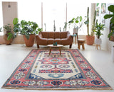 Vintage Turkish rug in a living room setting, pile rug, Turkish rug, vintage rug, portland, rug shop, bright colors, wild shaman, soft rug, bold color, Portland, Oregon, rug store, rug shop, local shop