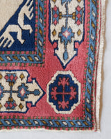 Vintage Turkish rug in a living room setting, pile rug, Turkish rug, vintage rug, portland, rug shop, bright colors, wild shaman, soft rug, bold color, Portland, Oregon, rug store, rug shop, local shop